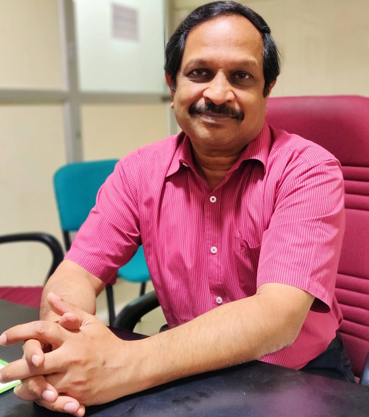 Dr. Janardhanam P